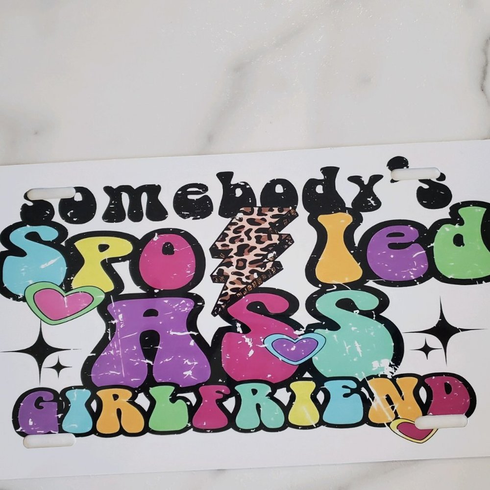 Somebody's Spoiled A$$ Girlfriend License Plate
